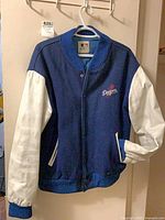 Full front view of Dodgers jacket on hanger