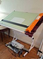 Full view of drafting table with parallel rule, side tray and accessories