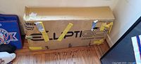 Closed ElliptiGO branded box on floor
