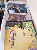 Rolled posters showing partial views of "The Two Jakes" and "Chinatown"