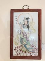 Front view of framed porcelain plaque showing full artwork and frame