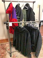 Rack of five jackets on garment rack