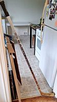 Full view of Easton Aluminum 5100 hockey stick leaning in room