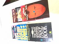 Front covers of six music books laid flat