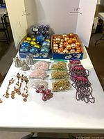 Overview of ornaments, angels and garlands on table