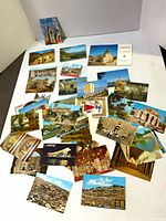 Overview of scattered unused travel postcards