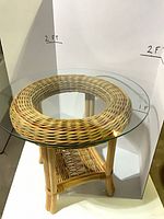 Angled view showing rattan frame and glass top