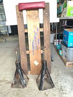 Front view of wooden creeper and two jack stands