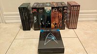 All DVD sets standing and Star Trek set laid flat