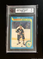 Front of KSA-slabbed Bobby Smith rookie card