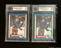 Fronts of both graded Brian Leetch rookie cards in KSA slabs