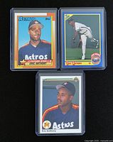 Front view of three Eric Anthony rookie cards in sleeves: Topps #608, Score #584, Upper Deck #28