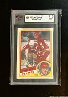 Front view of Hakan Loob O-Pee-Chee rookie card in KSA slab showing player image and 7.5 NM+ grade label