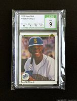 Front of graded 1990 Upper Deck Ken Griffey Jr. #156 card in CSG slab