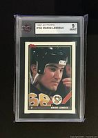 Front of KSA-slabbed Mario Lemieux Topps card showing player image and grade label