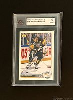 Front of KSA-slabbed Mario Lemieux Upper Deck card showing grade label