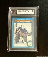 Front of KSA-slabbed 1979-80 O-Pee-Chee Mario Lessard rookie card