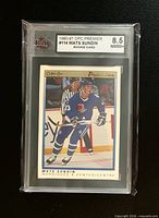 Front of graded Mats Sundin rookie card showing grade 8.5 and KSA label