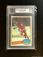 Front of graded Mike Foligno rookie card showing KSA 6.5 label and card image