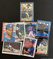 Front view of all eight Moises Alou cards