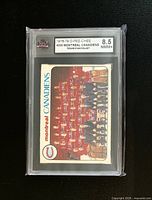 Front of graded trading card showing team photo and KSA 8.5 label