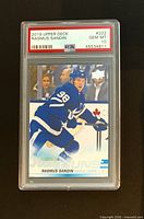 Front view of PSA-graded Rasmus Sandin Young Guns card showing image, card number and grade