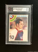 Front of graded Ron Duguay rookie card showing KSA grade 7 NM
