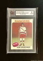 Front of KSA-slabbed rookie card, grade label visible