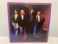 Front sleeve of BLVD LP with band image and MCA catalog number