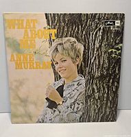 Front cover of Anne Murray What About Me LP, showing artist photo, title text, and Arc Stereo logo