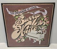 Front cover of Barry White The Message Is Love LP