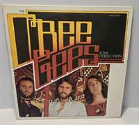 Front sleeve of Bee Gees Love Collection LP showing title, artists and wear