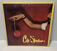 Front cover of Cat Stevens Izitso LP showing artwork and wear