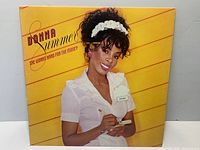 Front cover of Donna Summer She Works Hard for the Money LP
