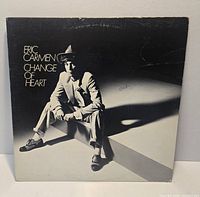 Front cover of Eric Carmen "Change of Heart" LP showing cover art and wear
