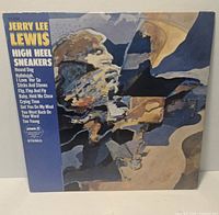 Front cover showing title, artist, track list and label info