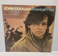 Front cover showing album title and artist
