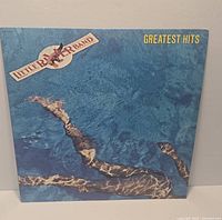 Front cover of vinyl LP showing title and artist
