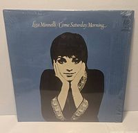 Front sleeve showing album art and shrink wrap