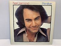 Front sleeve showing Neil Diamond Primitive cover art