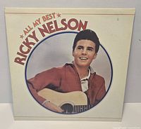 Front cover of Ricky Nelson All My Best LP showing portrait artwork and overall sleeve condition