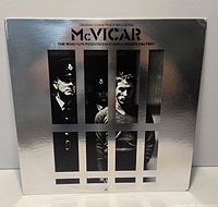 Front of silver McVicar LP jacket showing design and condition