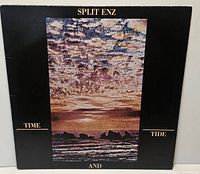 Front cover of Split Enz Time and Tide LP showing artwork and condition