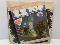 Front sleeve of Legendary Texas Tales 12" LP showing artwork and wear