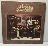 Front cover showing album artwork and wear