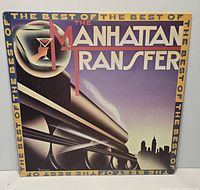 Front cover of The Manhattan Transfer “The Best of” LP showing artwork and wear