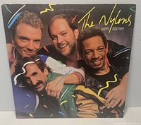 Front cover of The Nylons Happy Together LP with visible edge wear