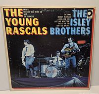 Front view of LP sleeve showing title, artists and visual wear