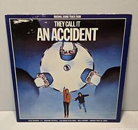 Front sleeve of They Call It an Accident soundtrack LP showing cover art and artist list