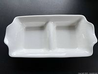 Top view of white rectangular two-section serving dish